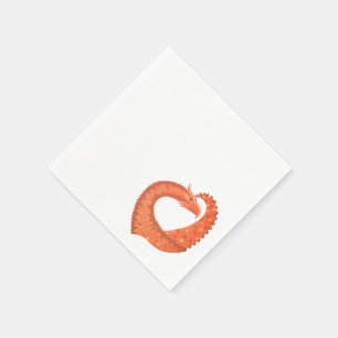 Orange heart dragon on white napkin