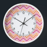 Orange & Hot Pink Chevron Pattern Clock<br><div class="desc">A bright and modern design with zigzag patterns. Click on the customise button to make more changes.</div>