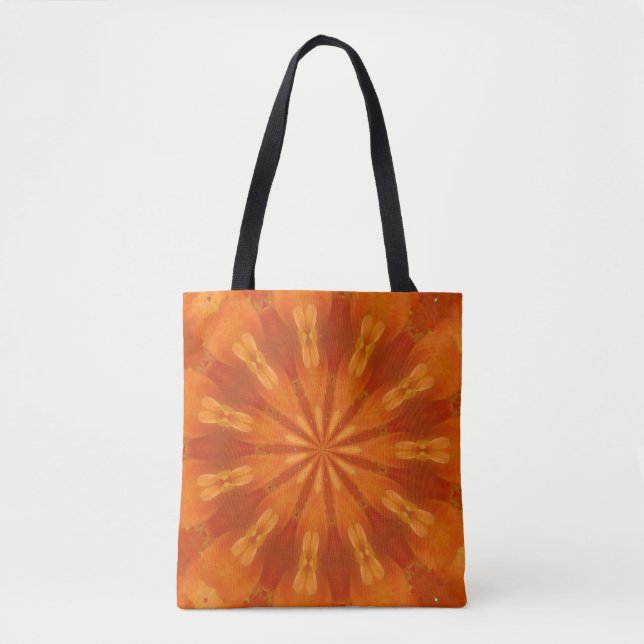Orange kaleidiscope on an all-over printed tote (Front)