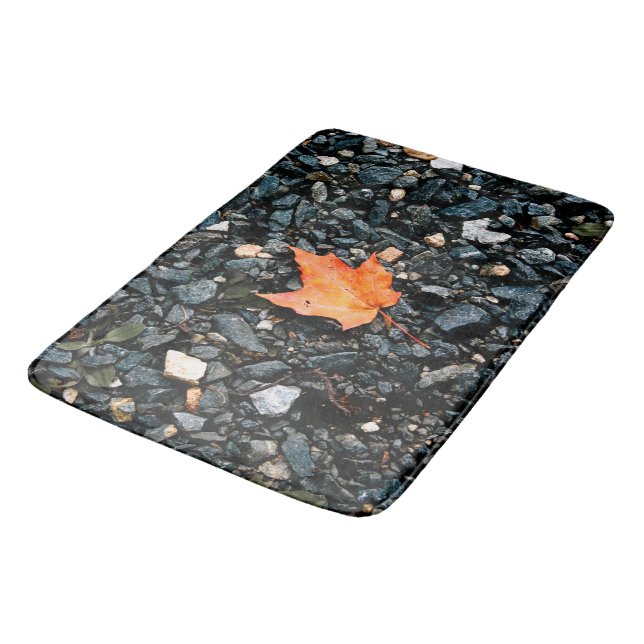 Orange Leaf on Black Rocks Bath Mat (Angled)