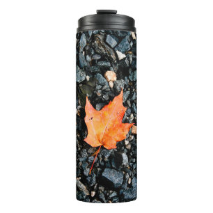 Orange Leaf on Black Rocks Thermal Tumbler