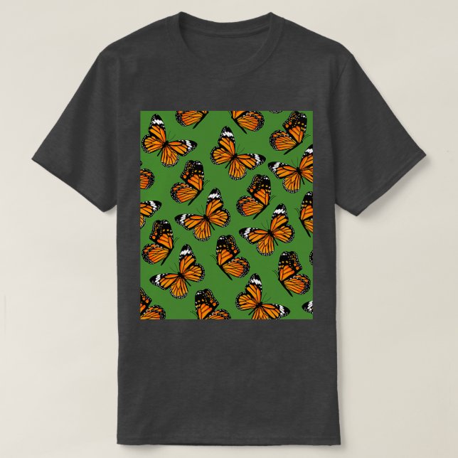 Orange Monarch Butterflies Pattern on Green T-Shirt (Design Front)