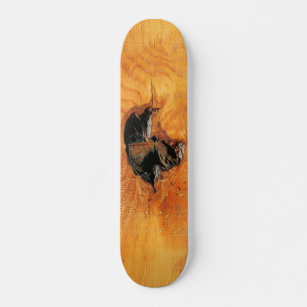 Orange natural wood with black hole and spiderweb skateboard