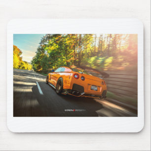 Orange Nissan GT-R Ripping through Seattle streets Mouse Pad