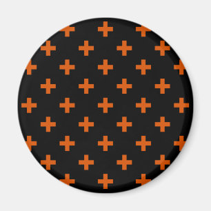 Orange polka crosses on black magnet