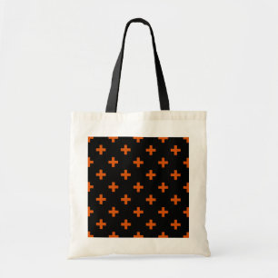 Orange polka crosses on black tote bag