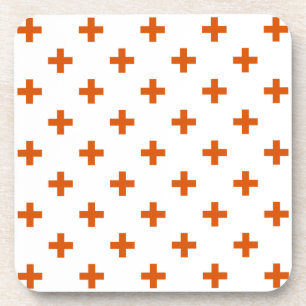 Orange polka crosses on white coaster