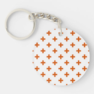Orange polka crosses on white key ring