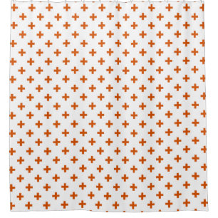 Orange polka crosses on white shower curtain