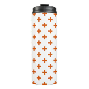 Orange polka crosses on white thermal tumbler