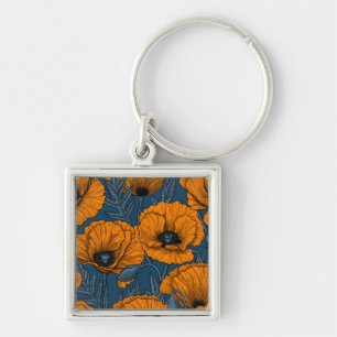Orange poppies on dark blue key ring