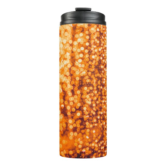 Orange raindrops on glass, abstract background. thermal tumbler (Front)