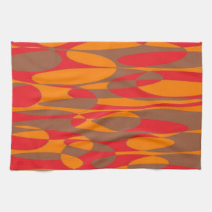 Orange, red and brown elliptical design tea towel