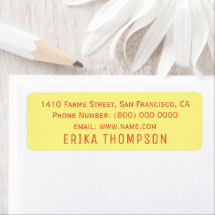 Orange red letters on pale yellow return address label