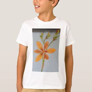 Orange spotted Iris called a  Blackberry lily T-Shirt