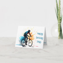 orange, teal and black cyclist Birthday Card