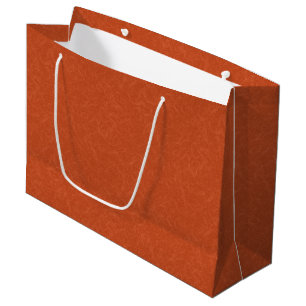 Orange textured surface with swirling pattern large gift bag