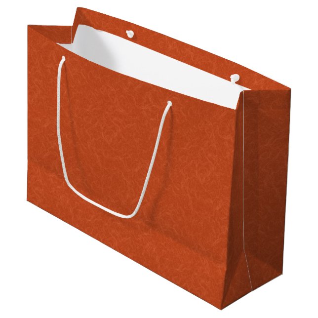 Orange textured surface with swirling pattern large gift bag (Front Angled)