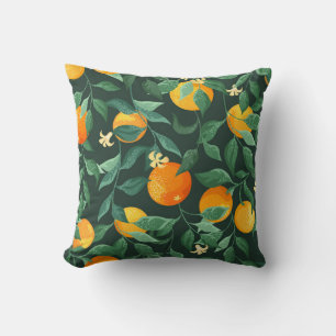 Orange trees, branches with flowers on a green bac cushion