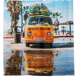 Orange van with surfboard on top shower curtain