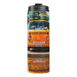 Orange van with surfboard on top thermal tumbler