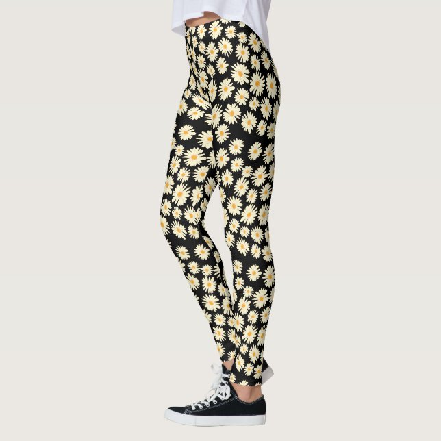Orange white black daisy flower pattern leggings (Left)