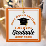 Orange White Graduate 2026 Personalized Christmas Ceramic Ornament<br><div class="desc">This modern orange and white custom graduate Christmas ornament feature classy typography of your university or college name for the class of 2026. Customize with your graduating year next to the chic handwritten script and black grad cap for a great personalized congratulations graduation gift.</div>