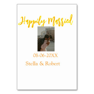 Orange yellow retro photo happily married couple table number