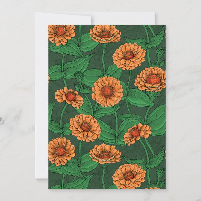 Orange Zinnia flowers, green leaves on dark green (Front)