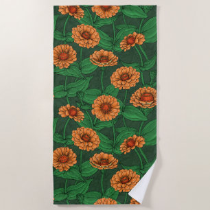 Orange Zinnia flowers, green leaves on dark green Beach Towel