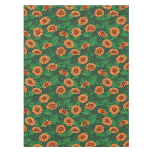 Orange Zinnia flowers, green leaves on dark green Tablecloth