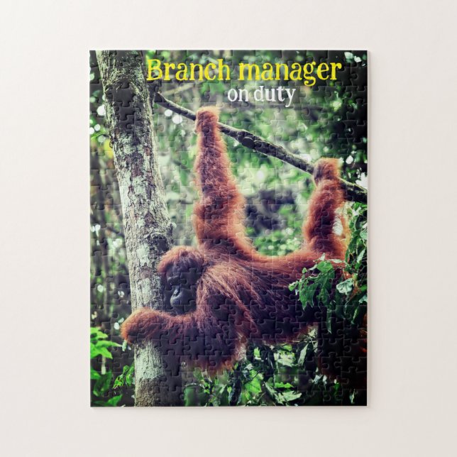 Orangutan hanging in tree jigsaw puzzle (Vertical)