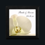 Orchid Flower on White Wedding Gift Box<br><div class="desc">Customise the pretty Orchid Flower on White Wedding Gift Box with the personal names of the bride and groom and marriage ceremony date to create a personalised keepsake gift for the newlyweds or a thank you gift for your wedding attendants, bridesmaids and bridal party. This elegant custom flowery trinket box...</div>