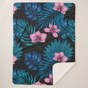 Orchids and palm leaves, pink and blue on black sherpa blanket