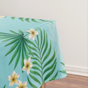 Orchids and palm leaves, pink and blue on black tablecloth