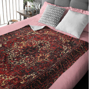 Oriental rug design in dark red fleece blanket