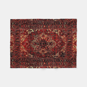 Oriental rug design in dark red fleece blanket