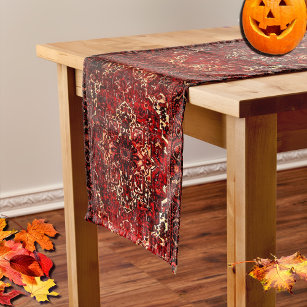 Oriental rug design in  dark red long table runner