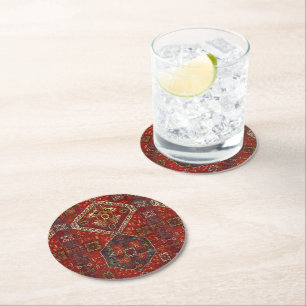 Oriental rug design in dark red round paper coaster
