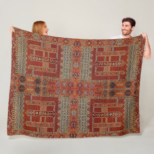 Oriental rug design in orange fleece blanket