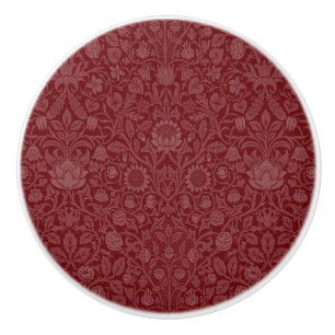 Oriental style floral design in dark red ceramic knob