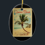 Ormond Beach Palm Tree Vintage Travel Ceramic Ornament<br><div class="desc">A uniquely retro mid-century modern Ormond Beach Florida art print in vintage travel poster style. It features a curved palm tree on sandy beach with ocean under a blue cloudy sky.</div>