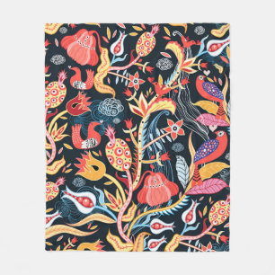 ornamental floral pattern with birds on a dark bac fleece blanket