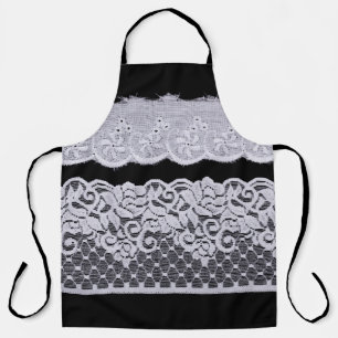 Ornamental white lace, isolated black background. apron