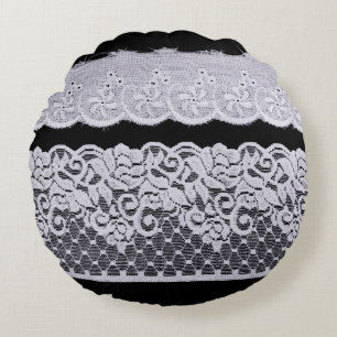 Ornamental white lace, isolated black background. round cushion