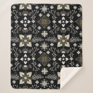 Ornate black and white floral pattern sherpa blanket