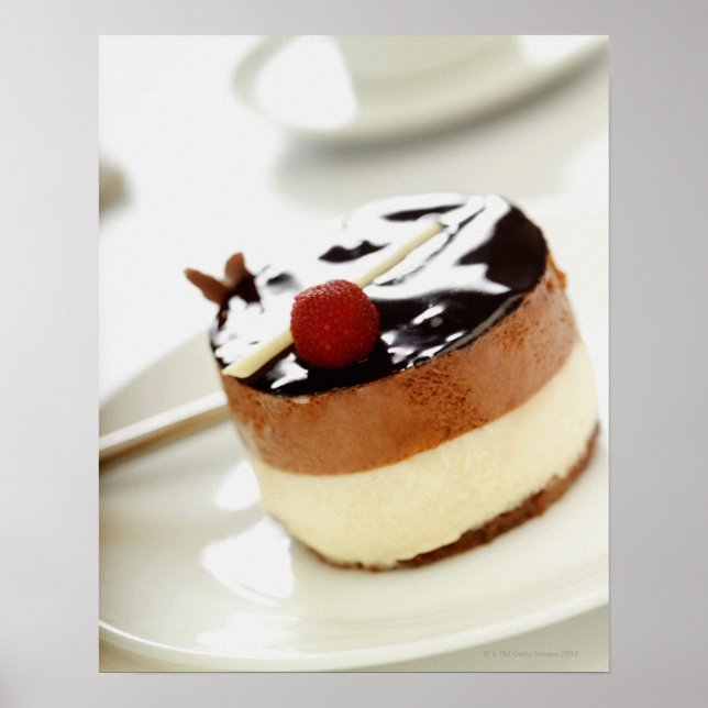 Ornate cheesecake on plate with coffee cup in poster (Front)