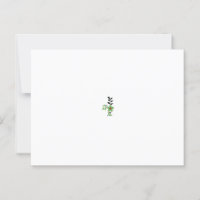 Ornate green flower with red centre, dark leaves, 