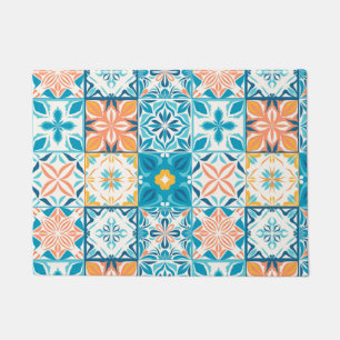 Ornate tiles in blue and orange doormat