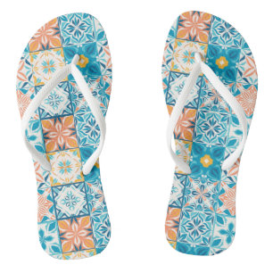 Ornate tiles in blue and orange thongs